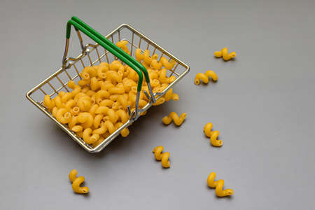 miniature basket for products from which pasta woke up. high quality photo