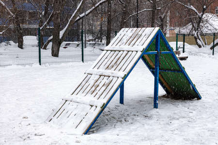 slide at the dog walking area during snowfall in winter. high quality photoの写真素材