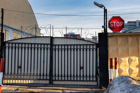 Moscow, Russia - March 02, 2022: closed gate leading to a special area. high quality photoの写真素材