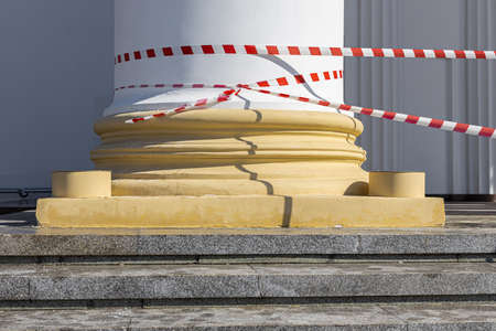 a large column to which a restrictive tape is attached. high quality photoの写真素材