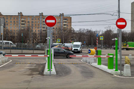 Moscow, Russia - April 14, 2022: exit from paid city parking equipped with a barrier.