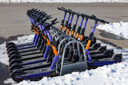 Moscow, Russia - April 04, 2022: scooters stand at the parking stationのeditorial素材