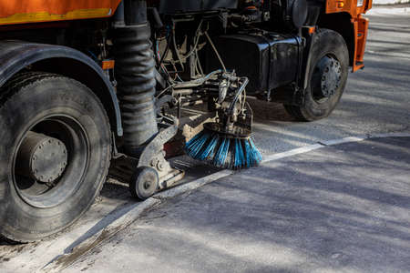 Moscow, Russia - April 20, 2022: a special machine cleans the curb and asphalt. high quality photoのeditorial素材