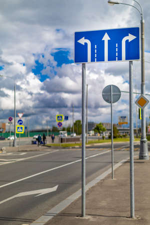 Moscow, Russia - May 28, 2022: road sign with arrows indicating the direction of travel. high quality photoのeditorial素材