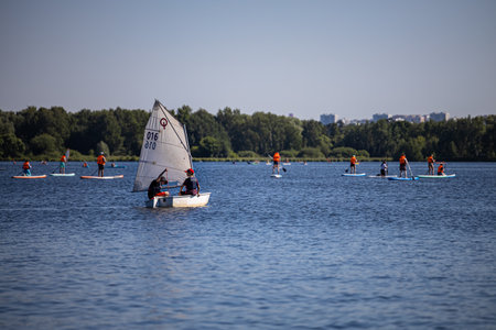 Moscow, Russia - July 01, 2022: a small boat with a sail goes on the river. high quality photoのeditorial素材