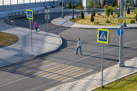 Moscow, Russia - July 01, 2022: a person crosses the road in the wrong place. high quality photoのeditorial素材
