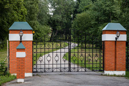 closed gates at the entrance to the estate. high quality photo