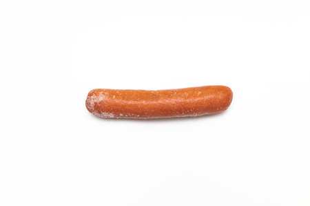 frozen sausage with traces of frost on a white background. frozen sausage. sausage isolated on white backgroundの写真素材