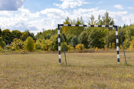 football goal in the field in the village. empty football goal