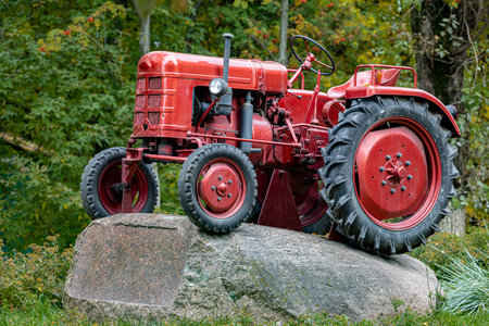 Moscow, Russia - October 01, 2022: old model tractor. red tractorのeditorial素材