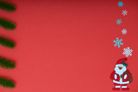 santa claus on red background with snowflakes. christmas red background. high quality photoの写真素材