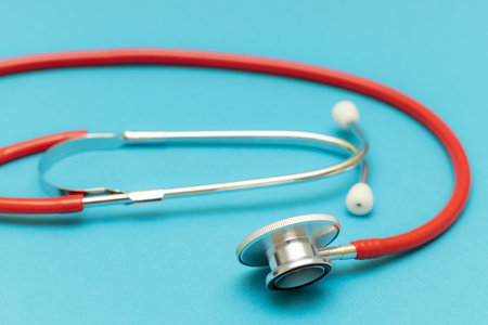 medical stethoscope on a blue background shot with blur. close-up shot of a stethoscope. medical instrumentsの写真素材