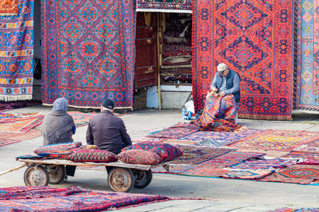 Moscow, Russia - April 22, 2023: oriental street market. oriental carpet market. oriental utensils. people at the marketのeditorial素材