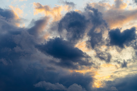 beautiful stormy sky with the sun peeping through. sky during a storm. a storm is coming