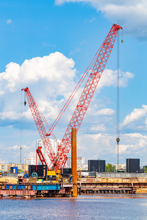 Moscow, Russia - July 01, 2023: crane in the seaport. marine crane. construction work on the coastのeditorial素材