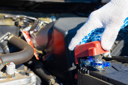 the master in the car service will check the battery terminal. car battery terminal. car battery connection. High quality photoの写真素材