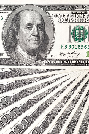 fan made of American dollars photographed close up. fan of dollars. American dollars close up....