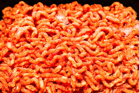 fresh minced meat in packaging, close-up shot. frozen fresh minced meat