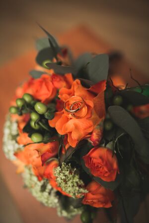 Pretty good wedding bouquet of various flowers with rings.の写真素材