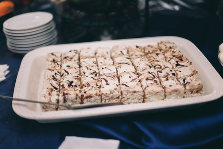Different delicious desserts and cakes on the buffet table.の写真素材