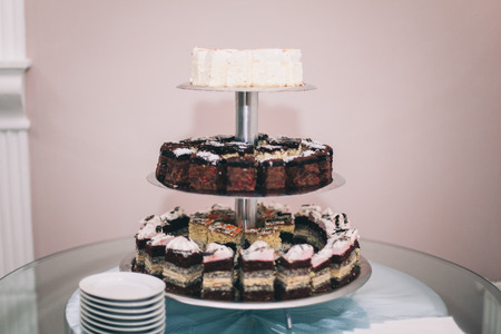 Different delicious desserts and cakes on the buffet table.の写真素材