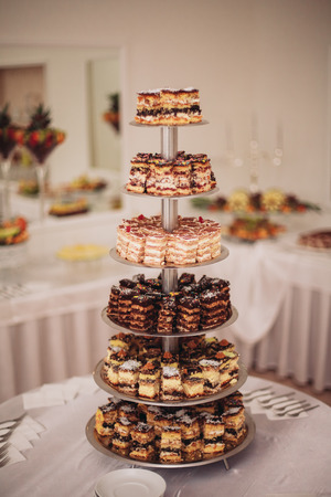Different delicious desserts and cakes on the buffet table.の写真素材