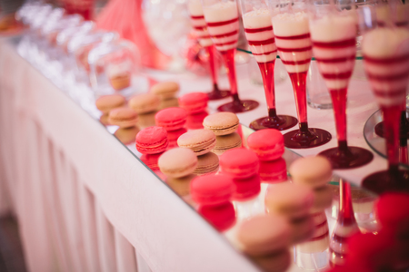 Different delicious desserts and cakes on the buffet table.の写真素材