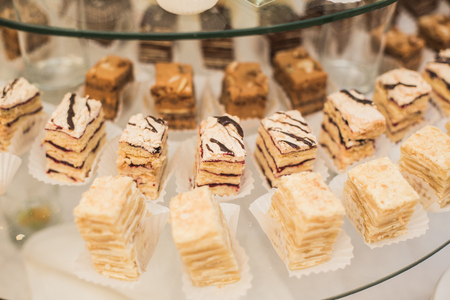 Different delicious desserts and cakes on the buffet table.の写真素材