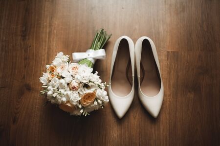 Wonderful luxury wedding bouquet with shoes of different flowers.の写真素材