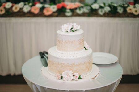 Luxury decorated wedding cake on the table.