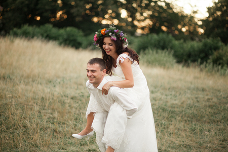 Beautiful wedding couple in park.の写真素材