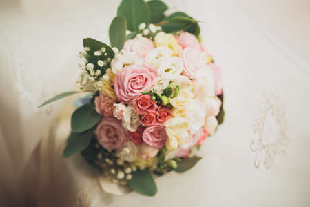 Wedding perfect bridal bouquet of different flowers.の写真素材