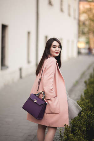 Young Asians girl with modern dress posing in an old Krakow.の写真素材