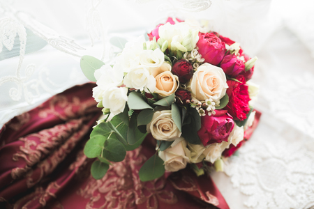 Wedding perfect bridal bouquet of different flowers.の写真素材