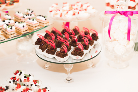 Buffet with a variety of delicious sweets, food ideas, celebration.の写真素材
