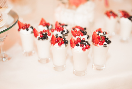 Delicious wedding reception candy bar dessert table.の写真素材