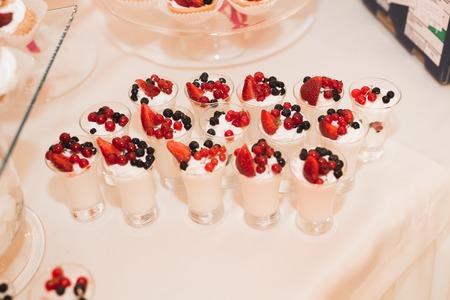 Buffet with a variety of delicious sweets, food ideas, celebration.の写真素材