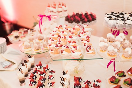 Buffet with a variety of delicious sweets, food ideas, celebration.の写真素材
