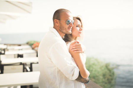 Fashion model couple with tattoo posing outside nea sea .の写真素材