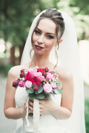 Romantic portrait of a beautiful blonde. Photo on a sunny day with bright colors.の写真素材