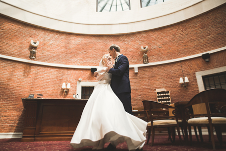 Luxury married wedding couple, bride and groom posing in old cityの写真素材