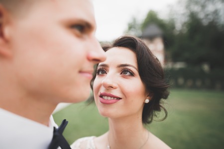 Sensual portrait of a young wedding couple. Outdoorの写真素材