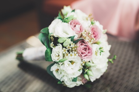 Beautiful wedding bouquet with different flowers, rosesの写真素材