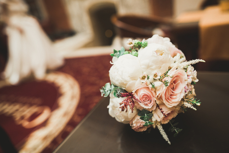 Beautiful wedding bouquet with different flowers, rosesの写真素材