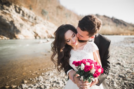 Sensual portrait of a young wedding couple. Outdoorの写真素材