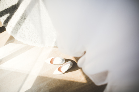White stylish wedding shoes for bride. Close-upの写真素材
