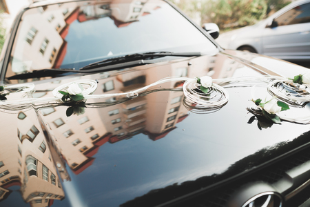 Wedding car decorated with beautiful, luxury flowersの写真素材