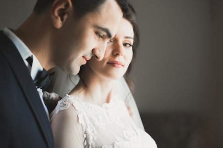 Sensual portrait of a young wedding couple. Outdoorの写真素材