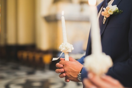 Wedding couple bide and groom get married in a churchの写真素材
