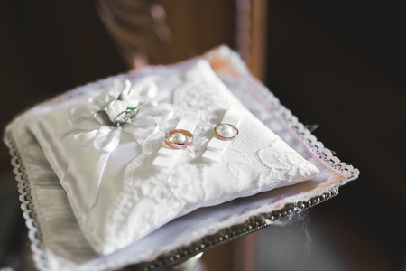 Wedding rings on ceremony at church. Macro.の写真素材